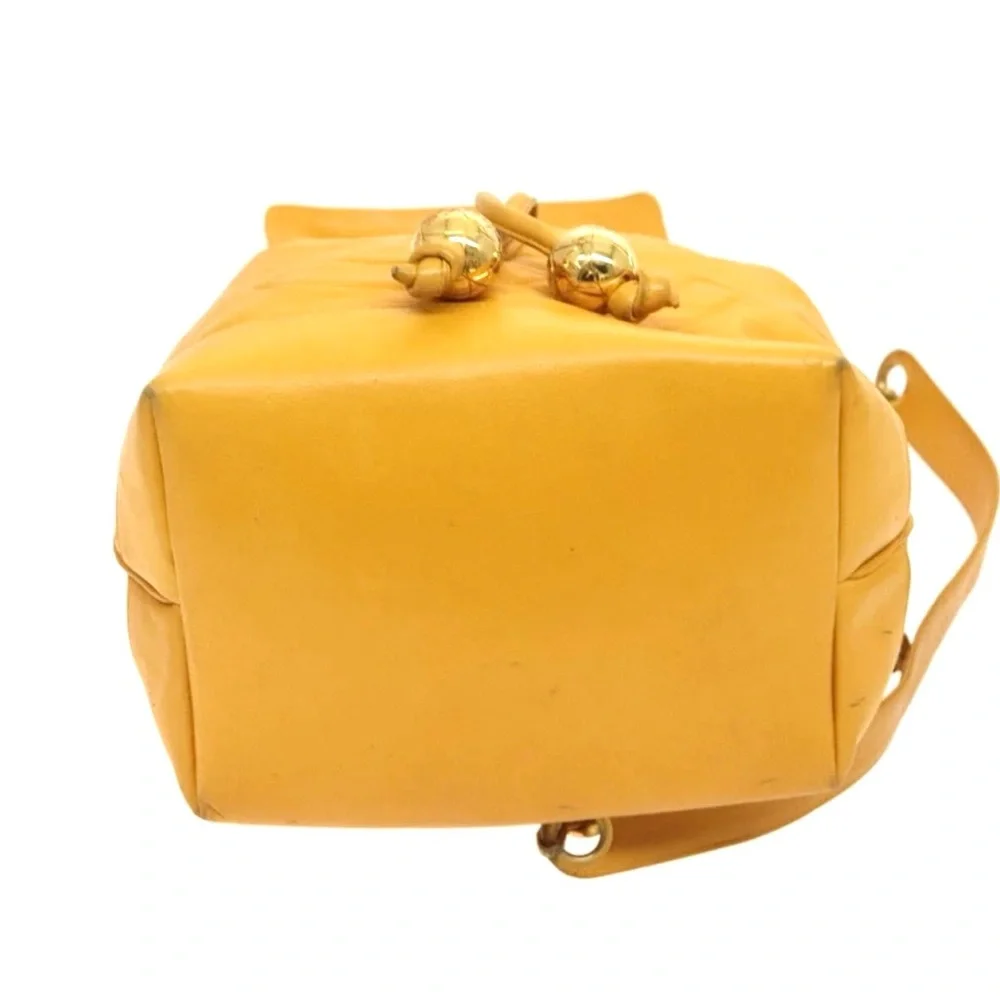 Authentic CHANEL yellow lambskin bucket bag with wallet pouch